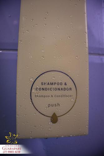 a skateboard with a sticker on the back of it at MAIOR NOTA - 2 Quartos com AR CONDICIONADOS SPLIT, Air Fryer, Wi-Fi, Disney Plus, Star Plus, HBO Max, Guarda Sol, Cadeiras de Praia, Caixa Térmica, Churrasqueira, Rede para Descanso e Chuveirão - 8 pessoas - CONFORTO Máximo - Melhor Localização!! in Guarapari