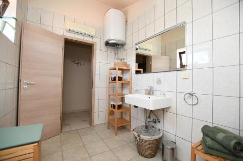 Koupelna v ubytování Apartments Deak