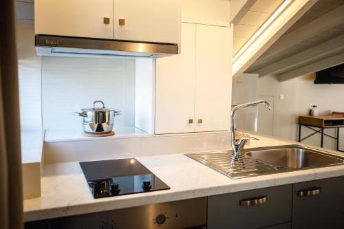 Virtuvė arba virtuvėlė apgyvendinimo įstaigoje GMA - Luxury Loft Nafplio