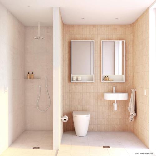 a bathroom with a toilet and a sink at Hotel Ravesis in Sydney