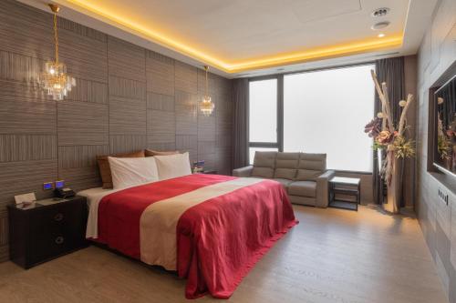Postel nebo postele na pokoji v ubytování 覓玥精品時尚旅館 Mi Yue Boutique Motel