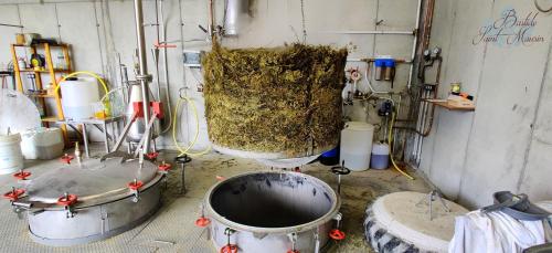 a room with two large buckets with hay in it at Bastide Saint Maurin in Ansouis