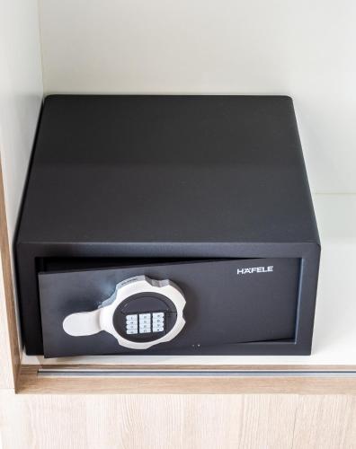 a black box with a remote control in it at Ozone Hotel Khao Yai in Mu Si
