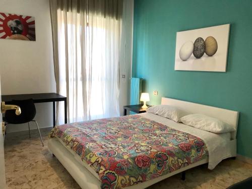 Ένα ή περισσότερα κρεβάτια σε δωμάτιο στο ROOM 110 BARI -guesthouse-
