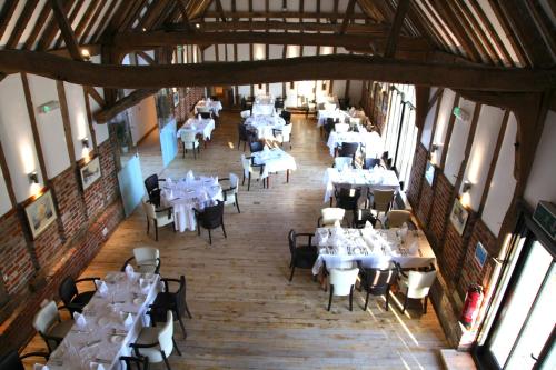 an overhead view of a dining room with tables and chairs at Ivy House Country Hotel in Lowestoft