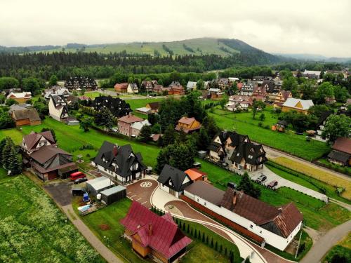 an aerial view of a small village with houses at Sielanka Apartamenty SPA in Białka Tatrzanska
