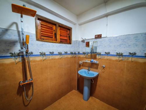 Vonios kambarys apgyvendinimo įstaigoje Guest Inn Avendra