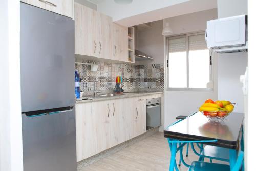 Kuchyň nebo kuchyňský kout v ubytování Apartamento Domínguez