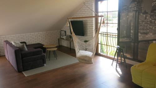 A seating area at APARTAMENTY ISKRA