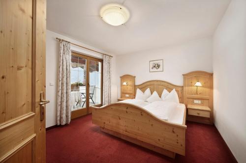 Voodi või voodid majutusasutuse Perlhof toas