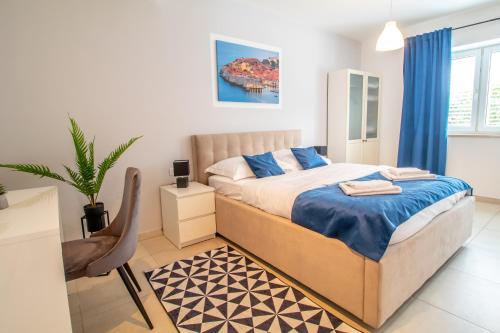 Ένα ή περισσότερα κρεβάτια σε δωμάτιο στο Apartments Vito