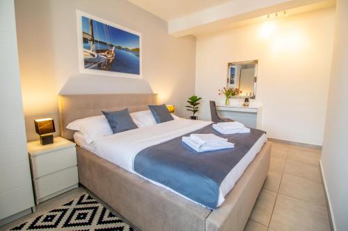 Ένα ή περισσότερα κρεβάτια σε δωμάτιο στο Apartments Vito