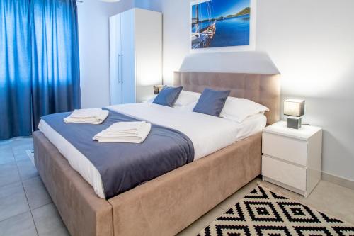 Postel nebo postele na pokoji v ubytování Apartments Vito