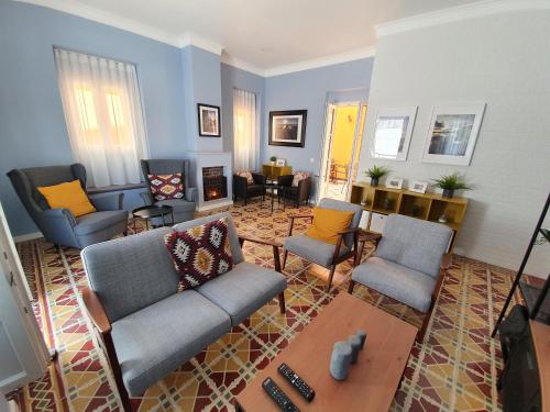Гостиная зона в Inn Faro - Casa Amarela - Guest House