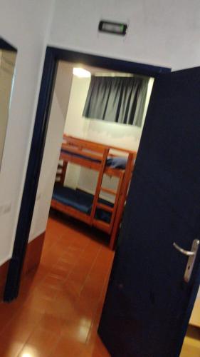 Ein Bett oder Betten in einem Zimmer der Unterkunft Hotel Caporal