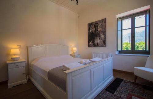 Ένα ή περισσότερα κρεβάτια σε δωμάτιο στο Villa Magoula