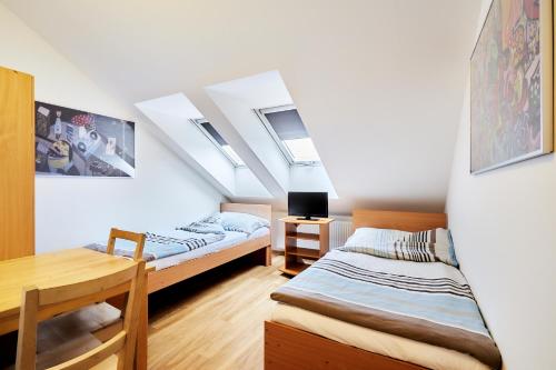 Postel nebo postele na pokoji v ubytování Apartmány Ubytování Alfa
