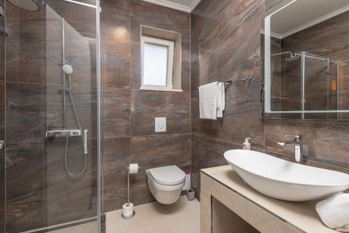 Koupelna v ubytování Apartments Cosmopolit