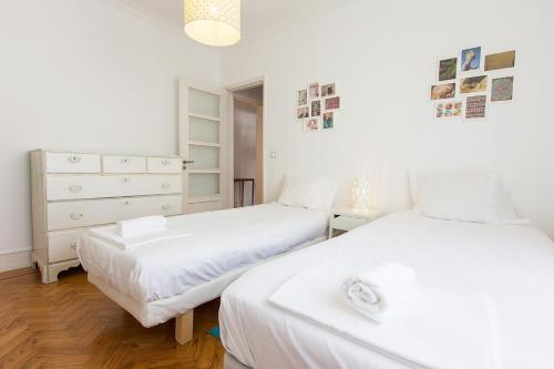 En eller flere senge i et værelse på Saldanha Concept by Homing