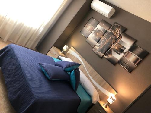 Postel nebo postele na pokoji v ubytování Hostal Doña María