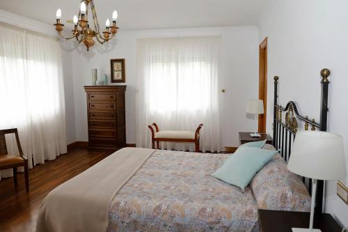 Postel nebo postele na pokoji v ubytování Casa de Castelo