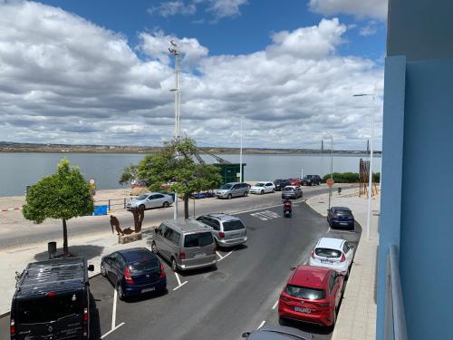 a highway with cars parked on the side of the road at Apartamento Mirando al Guadiana Centro in Ayamonte