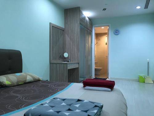 KLCC Apartment tesisinde bir odada yatak veya yataklar