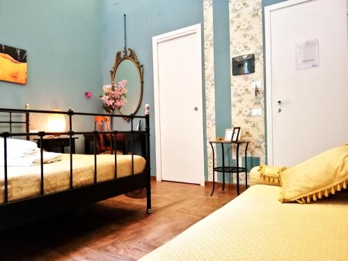 Cama o camas de una habitación en B&B Centro900