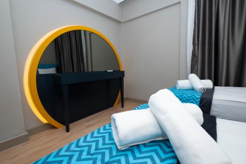 Postel nebo postele na pokoji v ubytování Sea City Devran Hotel & Spa