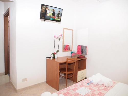 Ένα ή περισσότερα κρεβάτια σε δωμάτιο στο Locanda Basement Rooms