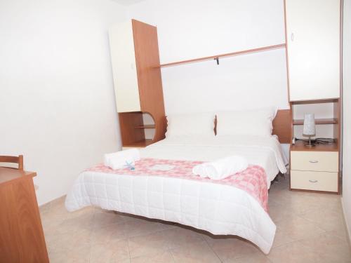 Ένα ή περισσότερα κρεβάτια σε δωμάτιο στο Locanda Basement Rooms