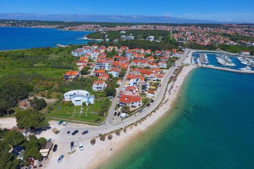an aerial view of a town on the beach at Apartments Borik in Zadar