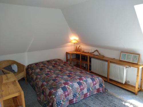 Katil atau katil-katil dalam bilik di Charmantes Ferienhaus in Nordfriesland