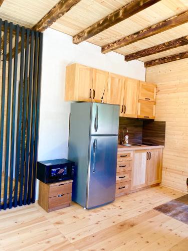 Kuchyň nebo kuchyňský kout v ubytování Villa Dabderr Mestia