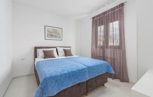 Ένα ή περισσότερα κρεβάτια σε δωμάτιο στο Apartments Zrnic