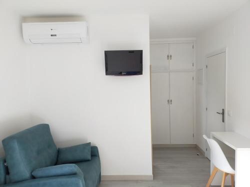 TV a/nebo společenská místnost v ubytování A Postiña