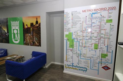 a large metro map on a wall in a room at Madrid Downtown Hostel in Madrid