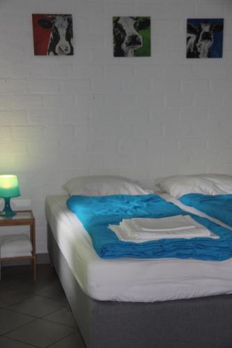 Cama o camas de una habitación en De Biesenberg