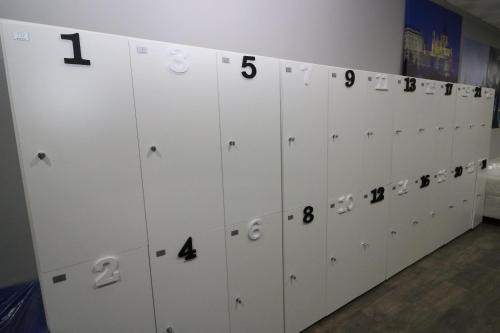 a row of lockers with numbers on them at Madrid Downtown Hostel in Madrid