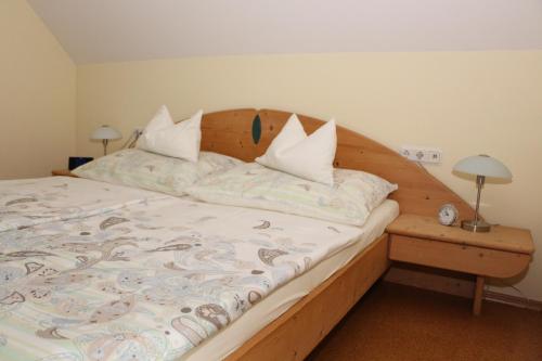Ένα ή περισσότερα κρεβάτια σε δωμάτιο στο Ferienwohnung Moni