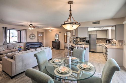a kitchen and living room with a table and chairs at Lake Havasu City Home with Views 3 Mi to Marina! in Lake Havasu City