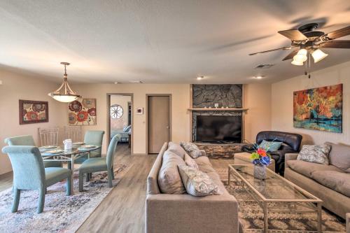 a living room with a couch and a table at Lake Havasu City Home with Views 3 Mi to Marina! in Lake Havasu City