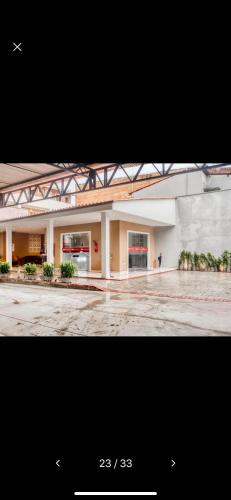 a picture of a large building with at Mega Aeroporto Hotel Apenas 1 km de distância do Aeroporto de Fortaleza in Fortaleza
