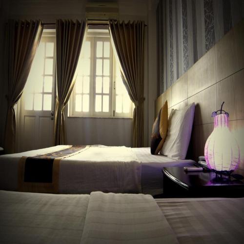 Katil atau katil-katil dalam bilik di Saigon Amigo Hotel