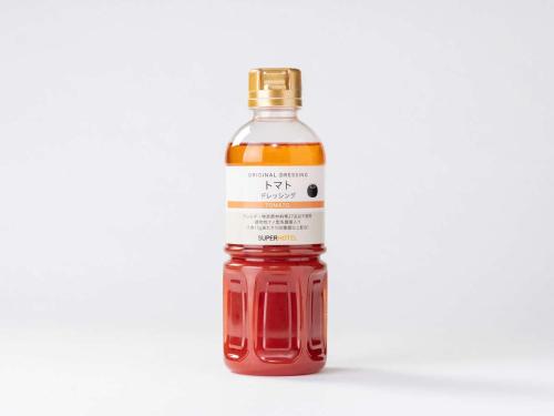 a bottle of red sauce on a white background at Super Hotel Sendai Airport Inter in Natori