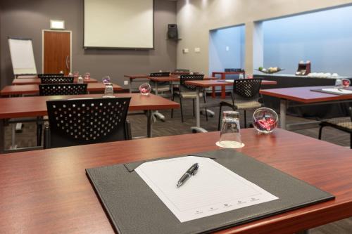 a pen sitting on top of a table in a room at City Lodge Hotel Durban in Durban