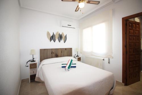 Postel nebo postele na pokoji v ubytování CASA CARLOS
