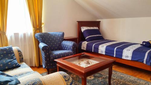 Säng eller sängar i ett rum på Villa Rava Hotel & restaurant