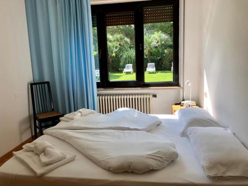 Krevet ili kreveti u jedinici u okviru objekta Spiaggia Residence
