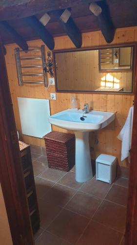 a bathroom with a white sink in a room at CASA TEO in Ávila